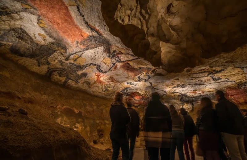 a group of people in a cave